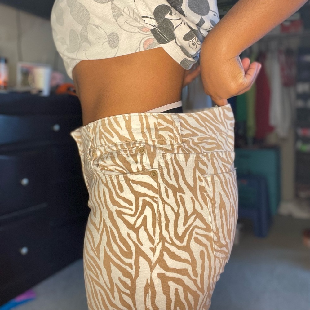 brown zebra printed jeans.